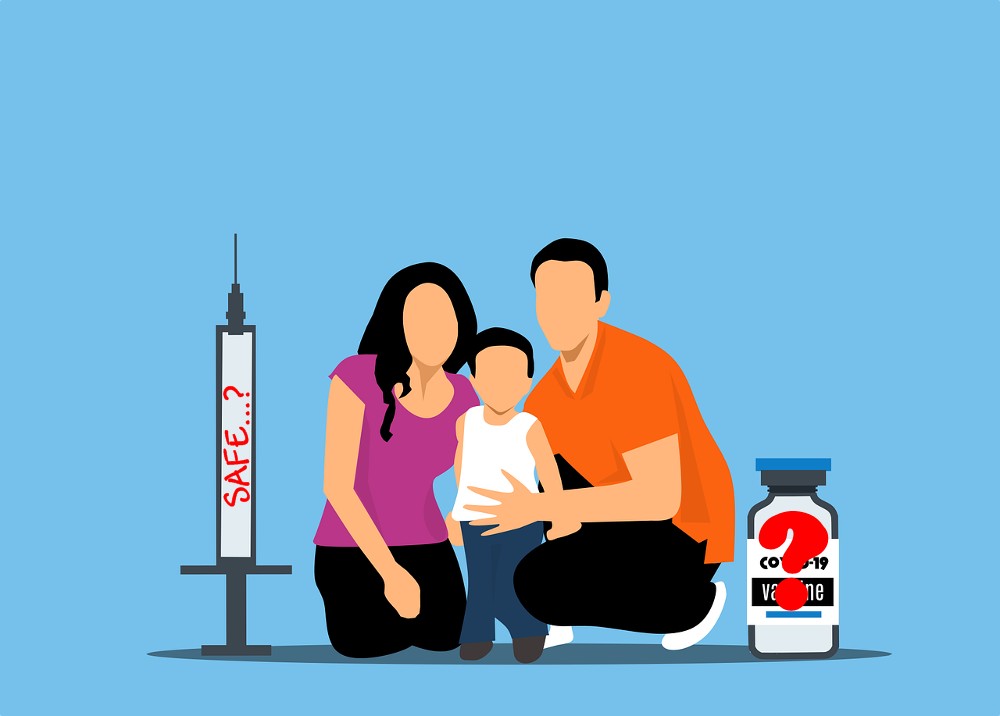 two parents with child and syringe