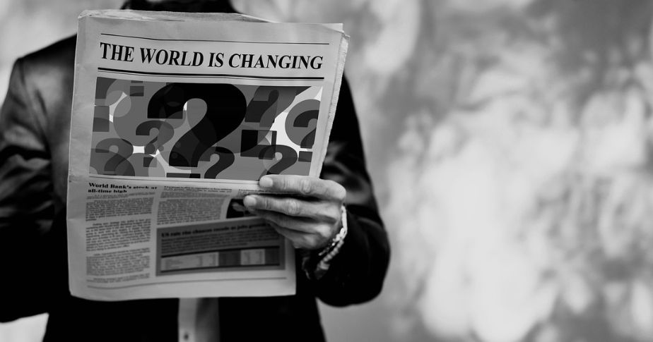 man reading newspaper