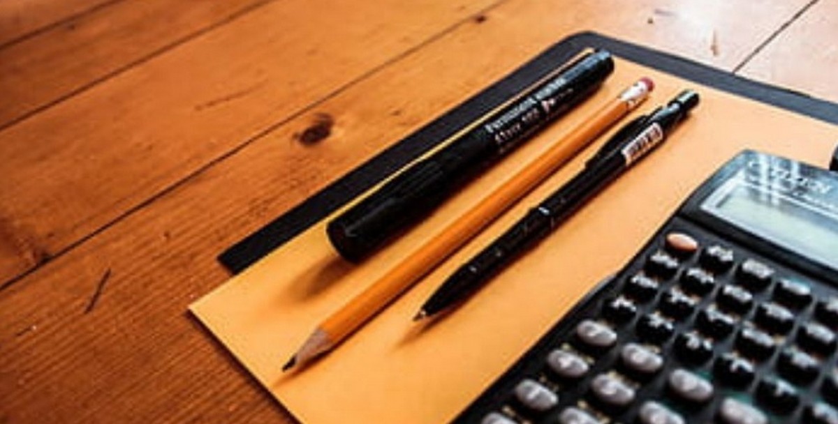 pencil pens and calculator