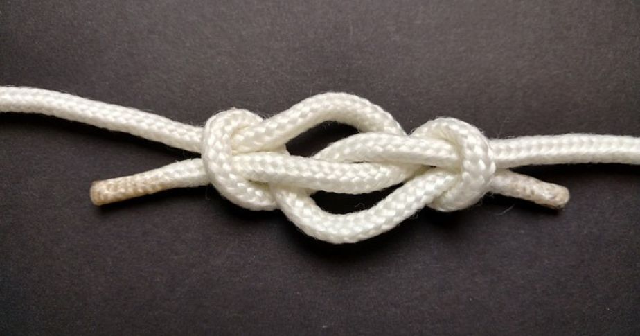 white knotted cords