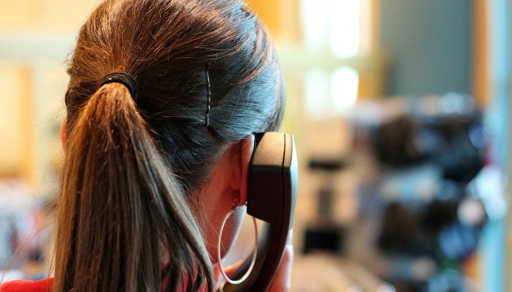 rear view of woman on phone