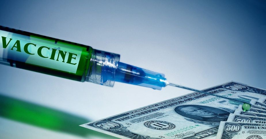 syringe and dollars