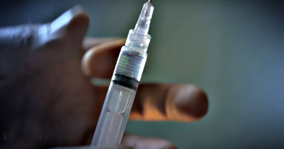 hand flicking vaccine needle